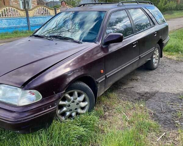 Фіолетовий Форд Скорпіо, об'ємом двигуна 2 л та пробігом 200 тис. км за 832 $, фото 1 на Automoto.ua