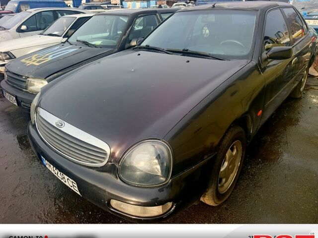 Коричневый Форд Скорпио, объемом двигателя 2 л и пробегом 220 тыс. км за 1850 $, фото 1 на Automoto.ua