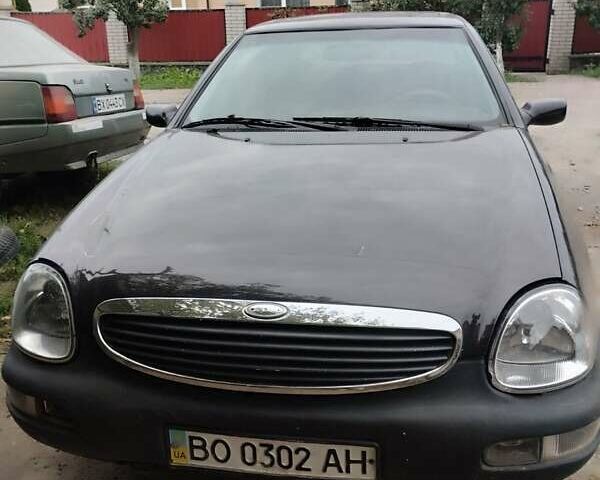 Коричневый Форд Скорпио, объемом двигателя 2 л и пробегом 200 тыс. км за 1100 $, фото 1 на Automoto.ua