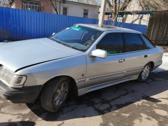 Сірий Форд Скорпіо, об'ємом двигуна 2 л та пробігом 315 тис. км за 474 $, фото 1 на Automoto.ua