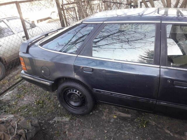 Серый Форд Скорпио, объемом двигателя 2 л и пробегом 299 тыс. км за 328 $, фото 1 на Automoto.ua