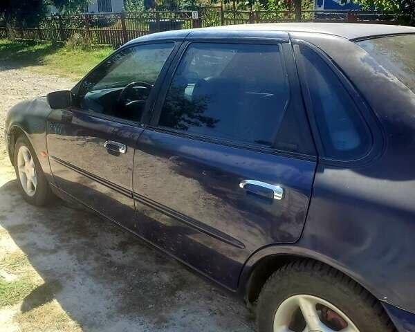 Синий Форд Скорпио, объемом двигателя 2.3 л и пробегом 300 тыс. км за 1100 $, фото 1 на Automoto.ua