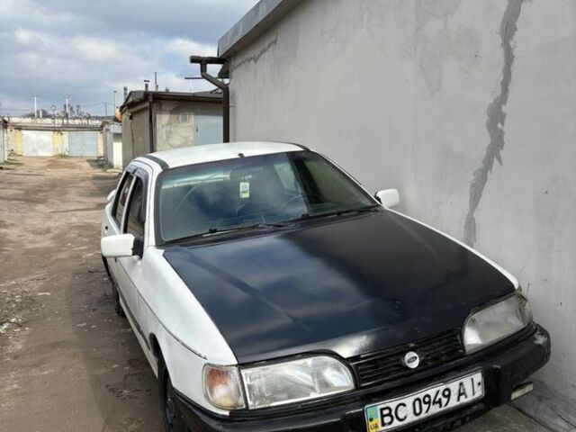 Белый Форд Сиерра, объемом двигателя 2 л и пробегом 200 тыс. км за 599 $, фото 1 на Automoto.ua