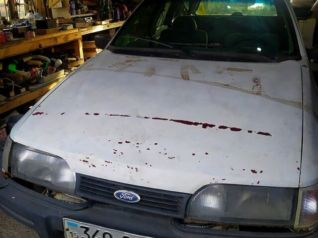 Белый Форд Сиерра, объемом двигателя 2 л и пробегом 300 тыс. км за 500 $, фото 1 на Automoto.ua