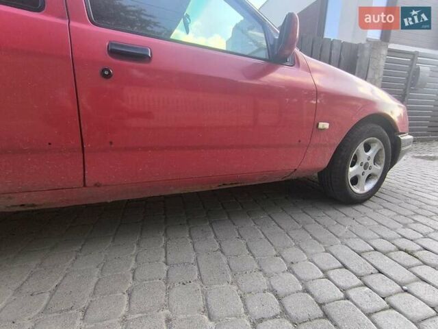 Красный Форд Сиерра, объемом двигателя 1.6 л и пробегом 100 тыс. км за 700 $, фото 1 на Automoto.ua
