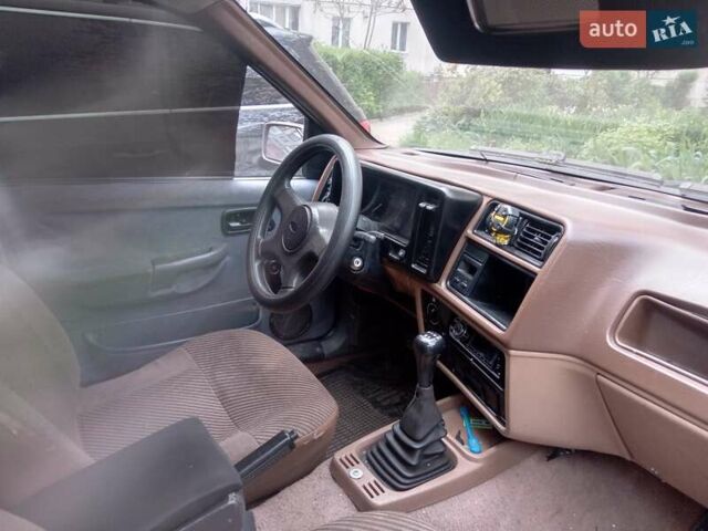 Сірий Форд Сієрра, об'ємом двигуна 2 л та пробігом 100 тис. км за 950 $, фото 1 на Automoto.ua