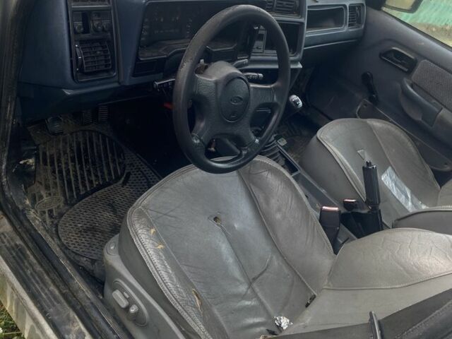 Серый Форд Сиерра, объемом двигателя 1.8 л и пробегом 260 тыс. км за 300 $, фото 1 на Automoto.ua