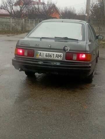 Сірий Форд Сієрра, об'ємом двигуна 2 л та пробігом 135 тис. км за 948 $, фото 1 на Automoto.ua