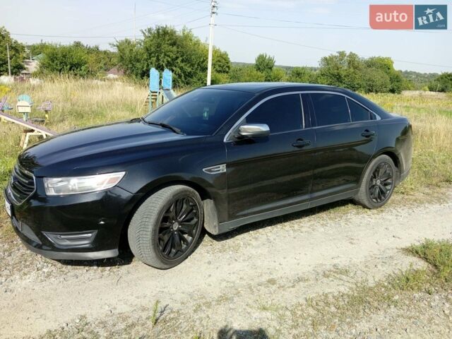 Чорний Форд Taurus, об'ємом двигуна 2 л та пробігом 260 тис. км за 11999 $, фото 1 на Automoto.ua