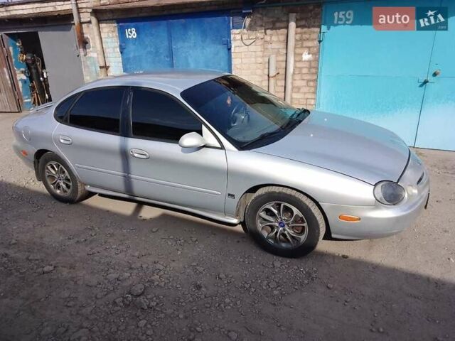 Сірий Форд Taurus, об'ємом двигуна 2.96 л та пробігом 190 тис. км за 1500 $, фото 1 на Automoto.ua