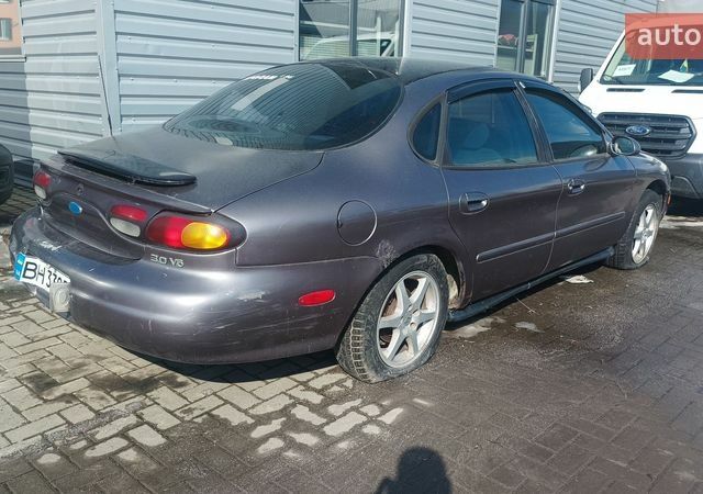 Серый Форд Таурус, объемом двигателя 3 л и пробегом 300 тыс. км за 600 $, фото 1 на Automoto.ua