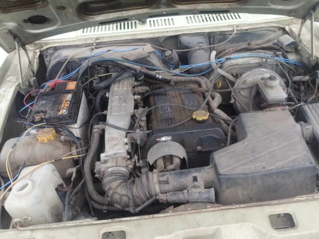 Зеленый Форд Таурус, объемом двигателя 2 л и пробегом 77 тыс. км за 450 $, фото 1 на Automoto.ua