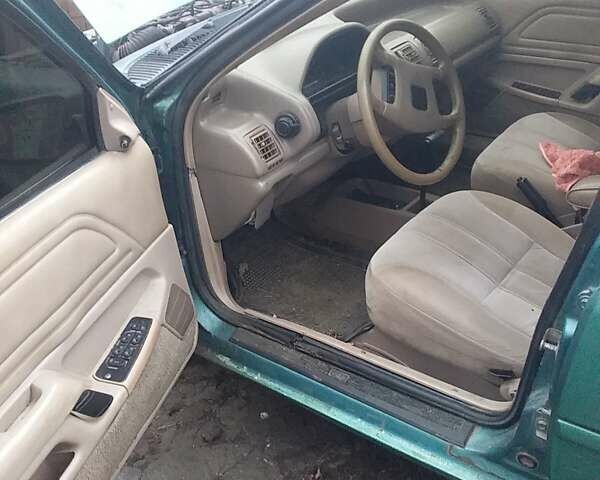 Зеленый Форд Темпо, объемом двигателя 2.45 л и пробегом 250 тыс. км за 1000 $, фото 1 на Automoto.ua