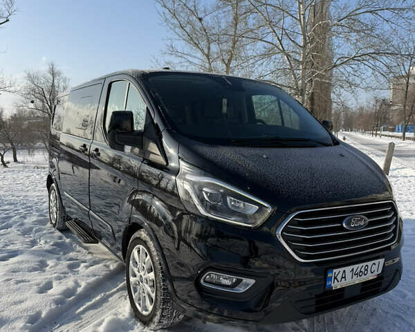 Черный Форд Турнео Кастом, объемом двигателя 2 л и пробегом 153 тыс. км за 28500 $, фото 1 на Automoto.ua