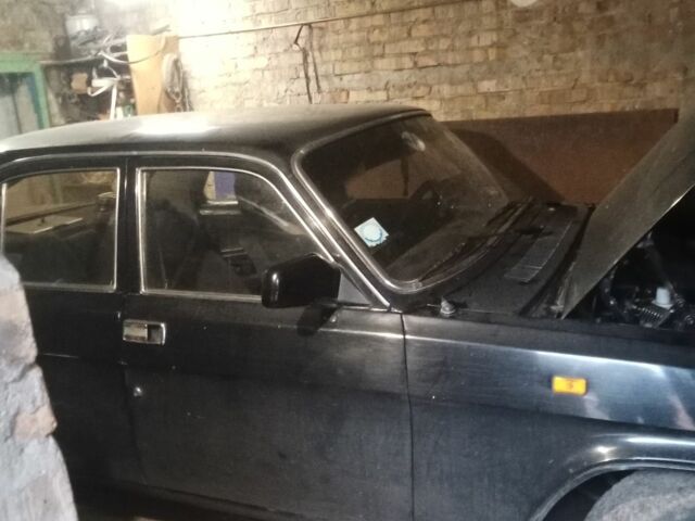 Черный ГАЗ 3110 Волга, объемом двигателя 2 л и пробегом 98 тыс. км за 750 $, фото 1 на Automoto.ua