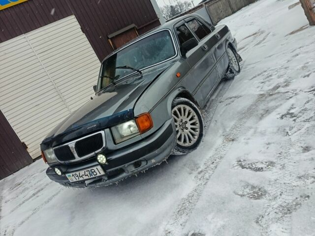 Серый ГАЗ 3110 Волга, объемом двигателя 2 л и пробегом 240 тыс. км за 589 $, фото 1 на Automoto.ua