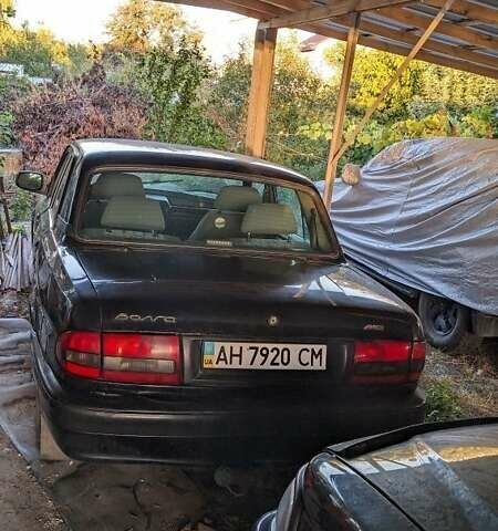 Чорний ГАЗ 31105 Волга, об'ємом двигуна 2.3 л та пробігом 58 тис. км за 1800 $, фото 1 на Automoto.ua