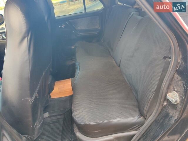 Чорний ГАЗ 31105 Волга, об'ємом двигуна 2.3 л та пробігом 370 тис. км за 1500 $, фото 1 на Automoto.ua