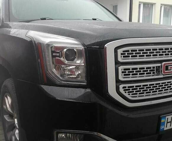 Черный ДжиЭмСи Юкон, объемом двигателя 5.33 л и пробегом 141 тыс. км за 35000 $, фото 1 на Automoto.ua