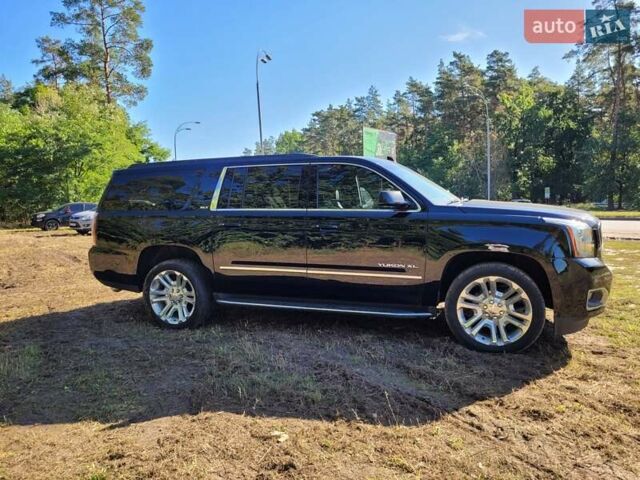Черный ДжиЭмСи Юкон, объемом двигателя 5.33 л и пробегом 101 тыс. км за 50000 $, фото 1 на Automoto.ua