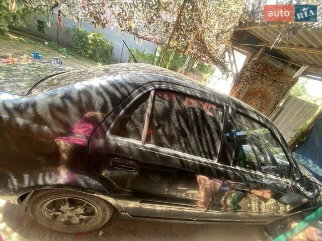 Черный Джили ЦК, объемом двигателя 1.5 л и пробегом 200 тыс. км за 1300 $, фото 1 на Automoto.ua