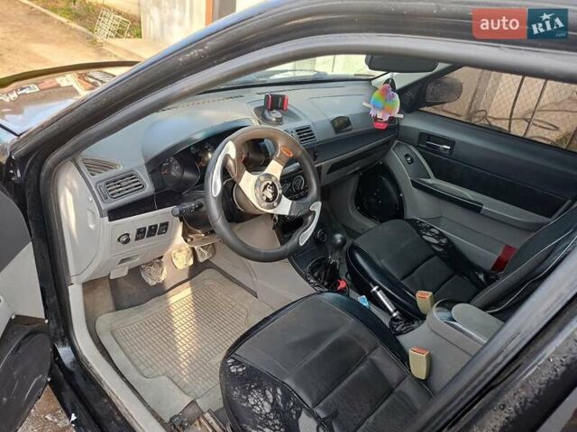 Чорний Джилі ЦК, об'ємом двигуна 1.6 л та пробігом 237 тис. км за 800 $, фото 1 на Automoto.ua