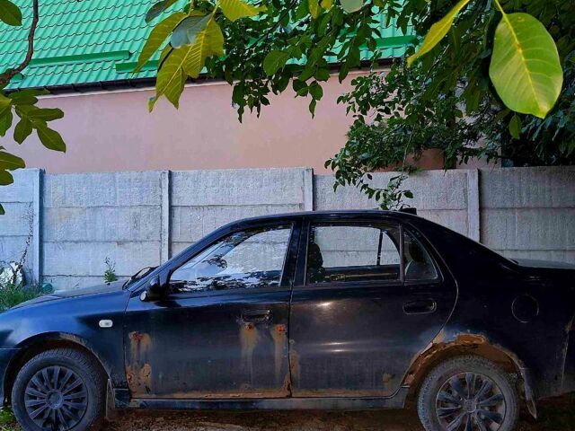 Черный Джили ЦК, объемом двигателя 1.6 л и пробегом 172 тыс. км за 600 $, фото 1 на Automoto.ua