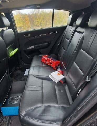 Чорний Джилі Емгранд, об'ємом двигуна 1.8 л та пробігом 200 тис. км за 3000 $, фото 1 на Automoto.ua