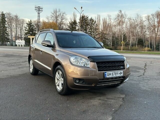 Коричневий Джилі Емгранд, об'ємом двигуна 2 л та пробігом 268 тис. км за 4799 $, фото 1 на Automoto.ua