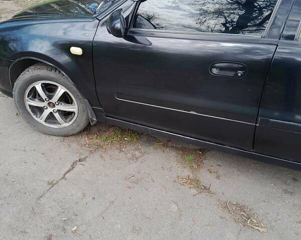 Черный Джили МР, объемом двигателя 1.5 л и пробегом 210 тыс. км за 2400 $, фото 1 на Automoto.ua