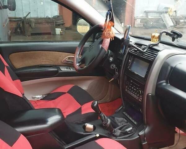 Черный Грейт Вол Ховер, объемом двигателя 2.4 л и пробегом 260 тыс. км за 5500 $, фото 1 на Automoto.ua