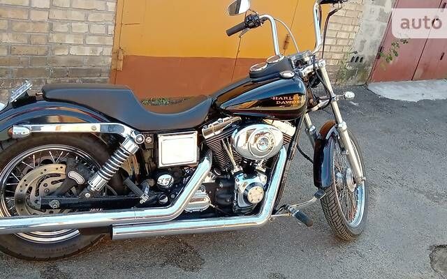 Черный Харлей-Дэвидсон 1450 Dyna Super Glide, объемом двигателя 1.45 л и пробегом 40 тыс. км за 9800 $, фото 1 на Automoto.ua