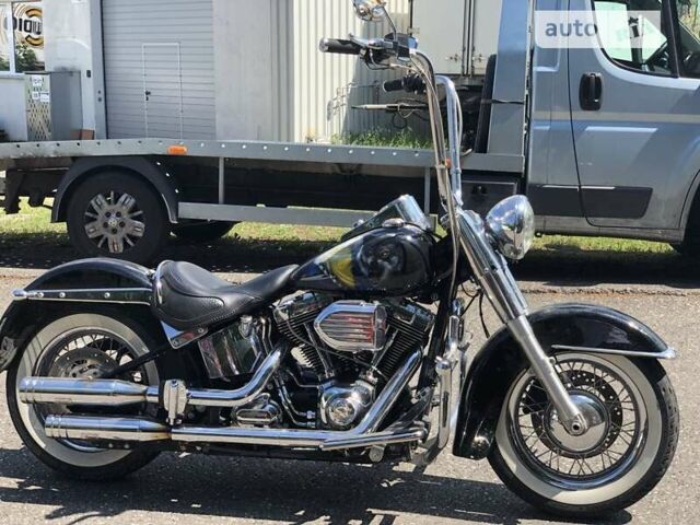 Чорний Харлей-Девідсон FLSTN Softail Deluxe, об'ємом двигуна 1.69 л та пробігом 13 тис. км за 16900 $, фото 1 на Automoto.ua