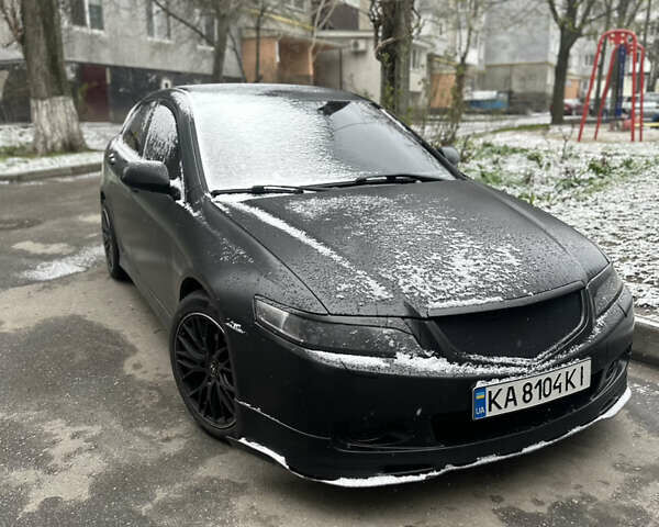 Черный Хонда Аккорд, объемом двигателя 2.35 л и пробегом 318 тыс. км за 7100 $, фото 1 на Automoto.ua