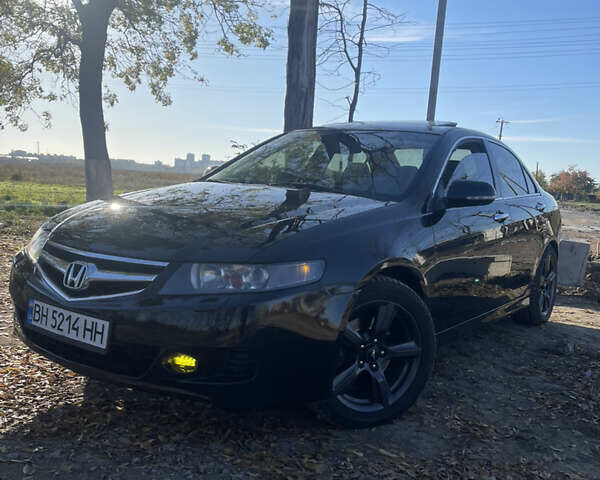 Черный Хонда Аккорд, объемом двигателя 2.4 л и пробегом 151 тыс. км за 7200 $, фото 1 на Automoto.ua