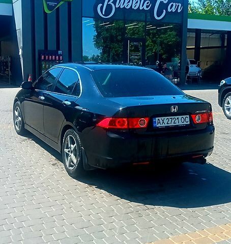 Черный Хонда Аккорд, объемом двигателя 2 л и пробегом 240 тыс. км за 6200 $, фото 1 на Automoto.ua