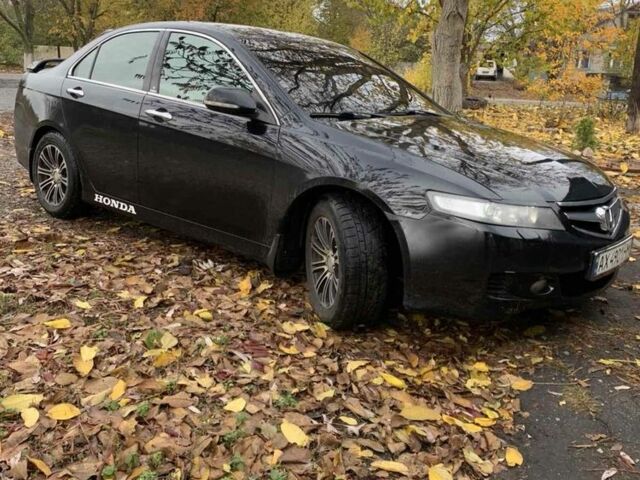 Черный Хонда Аккорд, объемом двигателя 2.4 л и пробегом 221 тыс. км за 7200 $, фото 1 на Automoto.ua