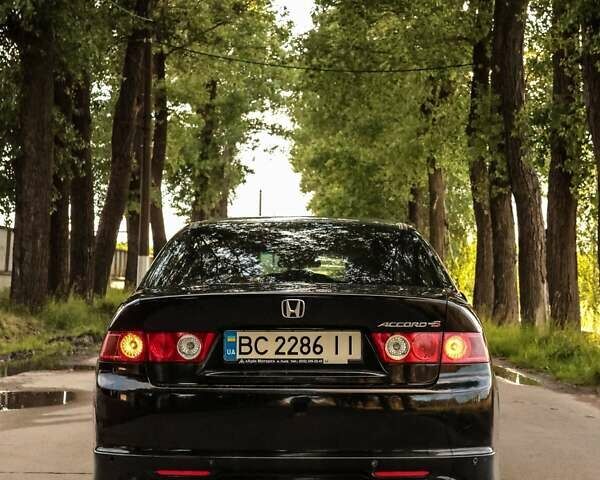 Черный Хонда Аккорд, объемом двигателя 2.4 л и пробегом 307 тыс. км за 5999 $, фото 1 на Automoto.ua