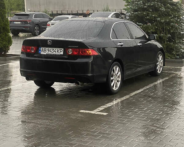 Черный Хонда Аккорд, объемом двигателя 2.4 л и пробегом 275 тыс. км за 6800 $, фото 1 на Automoto.ua