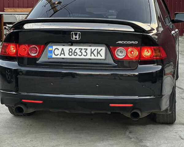 Черный Хонда Аккорд, объемом двигателя 2.4 л и пробегом 339 тыс. км за 6400 $, фото 1 на Automoto.ua