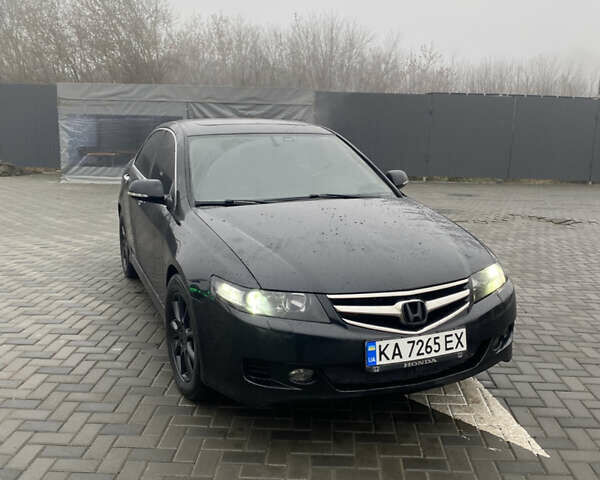 Черный Хонда Аккорд, объемом двигателя 2.4 л и пробегом 305 тыс. км за 6200 $, фото 1 на Automoto.ua