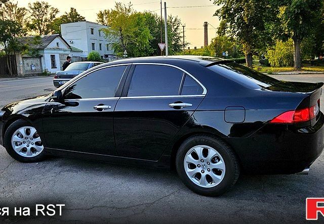Черный Хонда Аккорд, объемом двигателя 2.4 л и пробегом 173 тыс. км за 6800 $, фото 1 на Automoto.ua