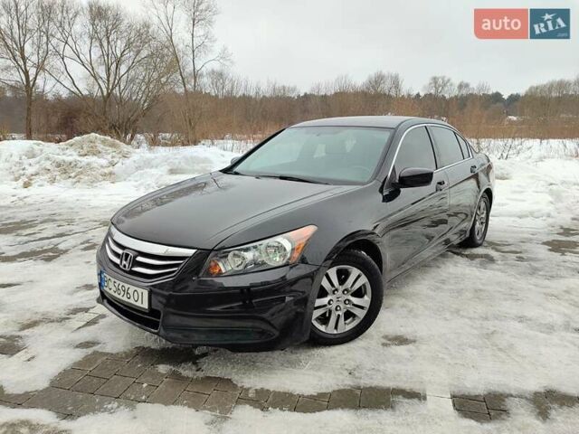 Черный Хонда Аккорд, объемом двигателя 2.4 л и пробегом 240 тыс. км за 9300 $, фото 1 на Automoto.ua