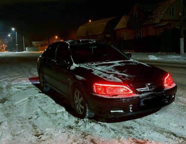 Черный Хонда Аккорд, объемом двигателя 1.6 л и пробегом 385 тыс. км за 3000 $, фото 1 на Automoto.ua