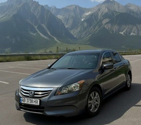 Серый Хонда Аккорд, объемом двигателя 2.4 л и пробегом 250 тыс. км за 8700 $, фото 1 на Automoto.ua