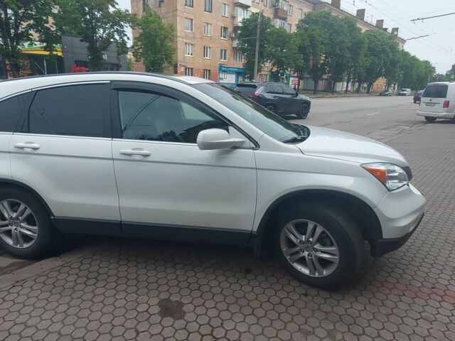 Белый Хонда СРВ, объемом двигателя 2.4 л и пробегом 250 тыс. км за 10450 $, фото 1 на Automoto.ua