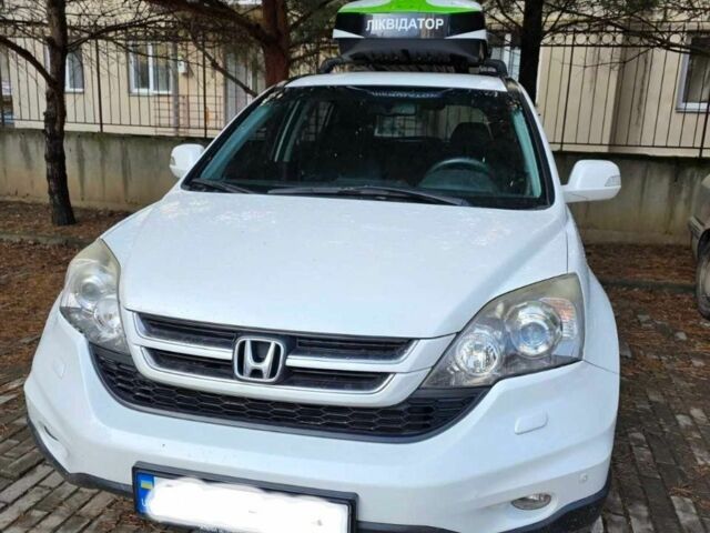 Белый Хонда СРВ, объемом двигателя 2 л и пробегом 219 тыс. км за 12900 $, фото 1 на Automoto.ua