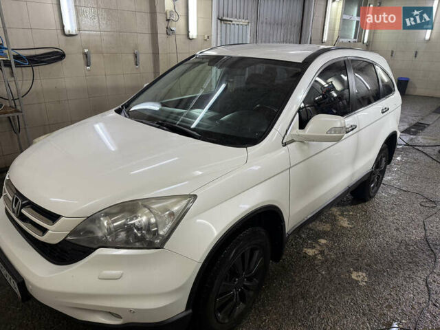Белый Хонда СРВ, объемом двигателя 2 л и пробегом 324 тыс. км за 11500 $, фото 1 на Automoto.ua