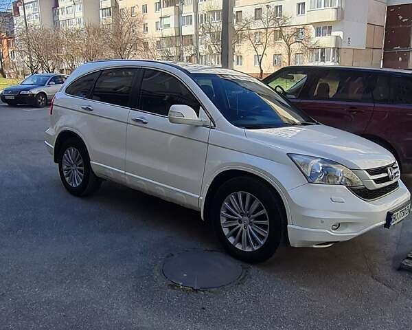 Белый Хонда СРВ, объемом двигателя 2.4 л и пробегом 290 тыс. км за 13200 $, фото 1 на Automoto.ua