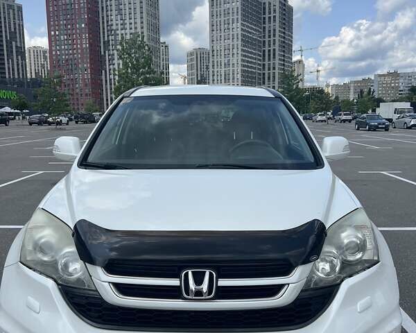 Белый Хонда СРВ, объемом двигателя 2 л и пробегом 171 тыс. км за 15000 $, фото 1 на Automoto.ua